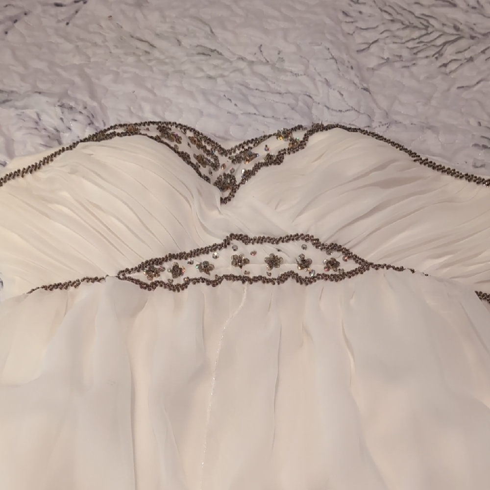 Elegant Cream Wedding Dress with Beaded Detail